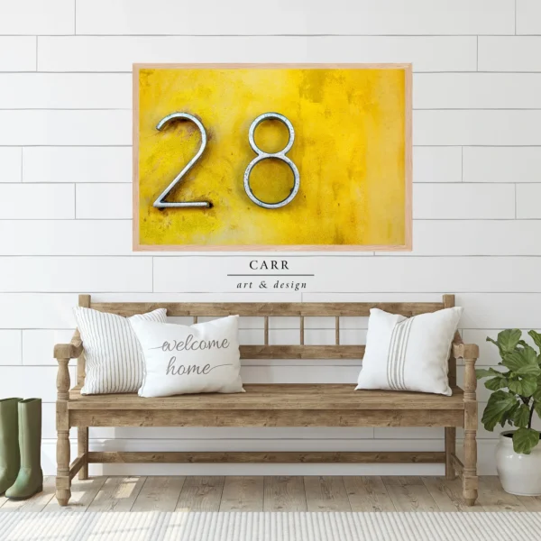 Vintage-Inspired Yellow Wall Decor with 28 Number Accent